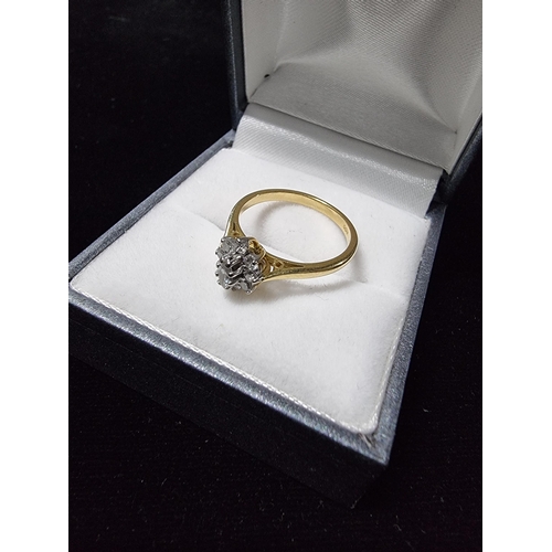 299 - Pretty hallmarked 18ct gold diamond cluster ring with a diamond to the centre surrounded by 8 smalle... 