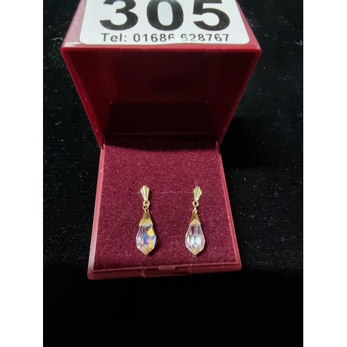 305 - Pair  of HM 9ct gold earrings with cut crystal drops presenting good colours in good condition total... 