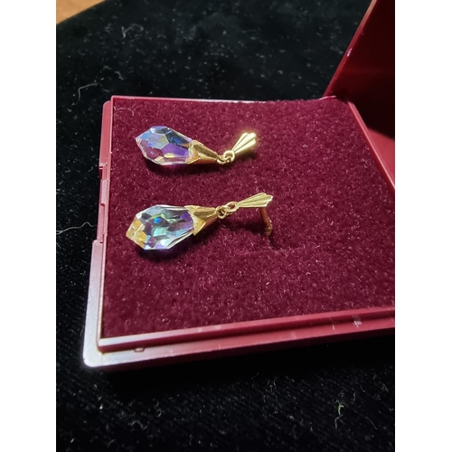 305 - Pair  of HM 9ct gold earrings with cut crystal drops presenting good colours in good condition total... 