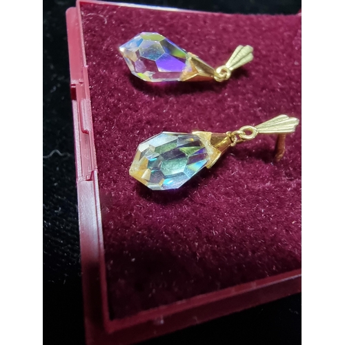 305 - Pair  of HM 9ct gold earrings with cut crystal drops presenting good colours in good condition total... 