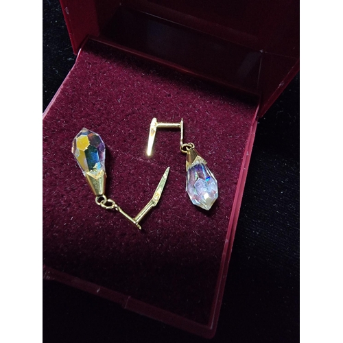 305 - Pair  of HM 9ct gold earrings with cut crystal drops presenting good colours in good condition total... 