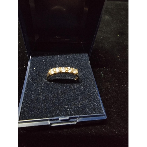 308 - 375 9ct gold ring with 5 CZ stones