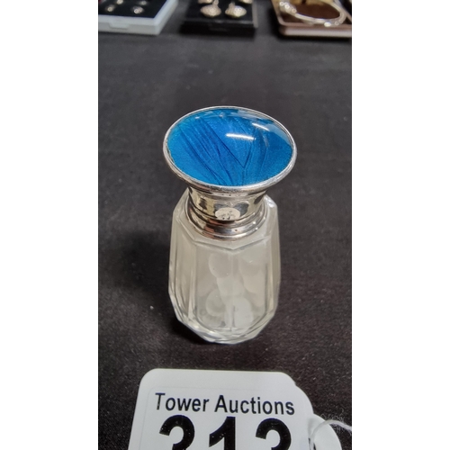 313 - Hallmarked silver topped glass scent bottle with a blue enamle top height 6cm width 3cm