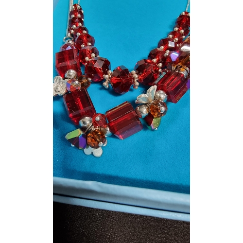 326 - 925 sterling silver necklace with red glass beads along with one other necklce with red glass beads