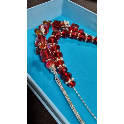 326 - 925 sterling silver necklace with red glass beads along with one other necklce with red glass beads