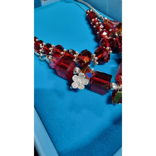 326 - 925 sterling silver necklace with red glass beads along with one other necklce with red glass beads