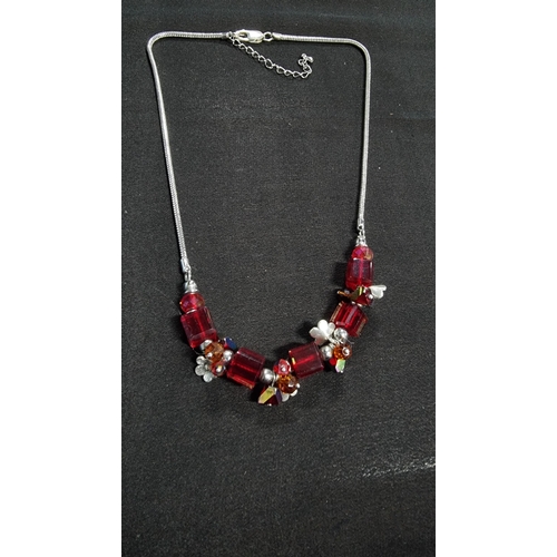 326 - 925 sterling silver necklace with red glass beads along with one other necklce with red glass beads