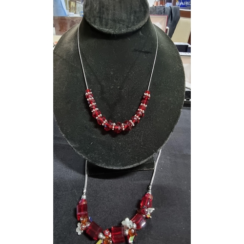 326 - 925 sterling silver necklace with red glass beads along with one other necklce with red glass beads