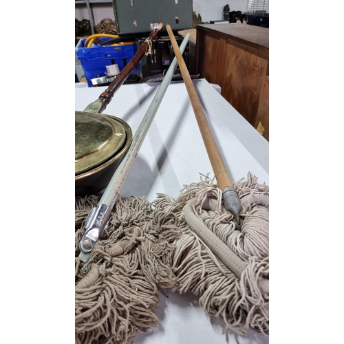 752 - 2 x mops and a vintage brass bed warmer