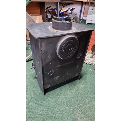 758 - Cast iron multi fuel burner in good condition but no flue height of 56cm width 46cm depth 32cm