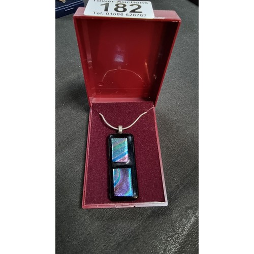 151 - Pretty Murano glass type pendant on a 18 inch 925 silver chain the glass pendant presents various co... 