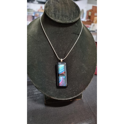 151 - Pretty Murano glass type pendant on a 18 inch 925 silver chain the glass pendant presents various co... 