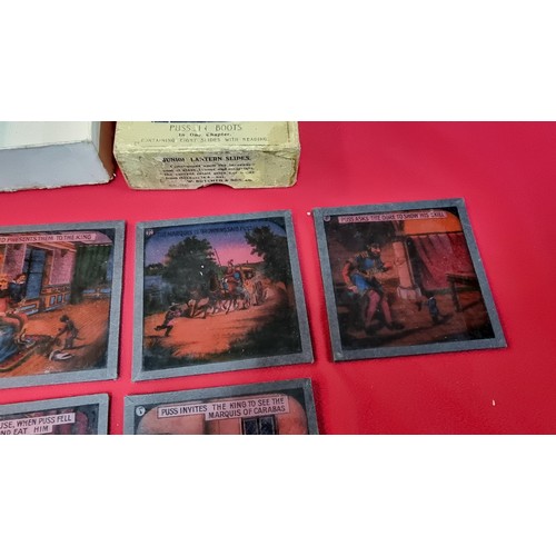 129 - Rare boxed set of Magic Lantern glass slides of Puss In Boots in one chapter, 1 slide is missing fro... 