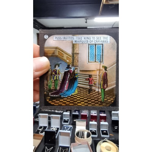 129 - Rare boxed set of Magic Lantern glass slides of Puss In Boots in one chapter, 1 slide is missing fro... 