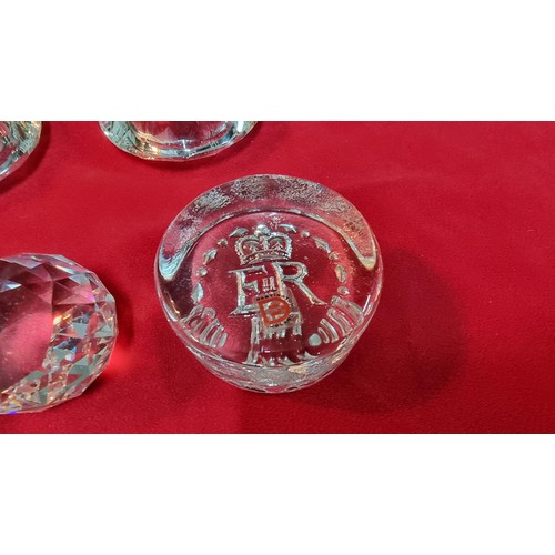 134 - 4x glass paperweights, 2x by Dartington along with 3x glass diamond formed T-light holders