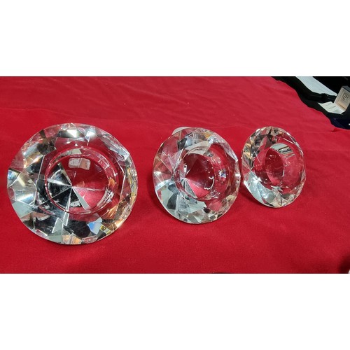 134 - 4x glass paperweights, 2x by Dartington along with 3x glass diamond formed T-light holders