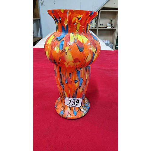 139 - Interesting multicoloured hand made art glass vase in good condition, displays very well. Height of ... 
