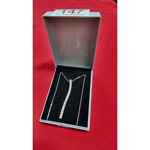 147 - 925 silver drop pendant, pave set with a quantity of CZ stones on a 18 inch 925 silver chain