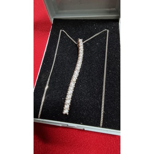 147 - 925 silver drop pendant, pave set with a quantity of CZ stones on a 18 inch 925 silver chain