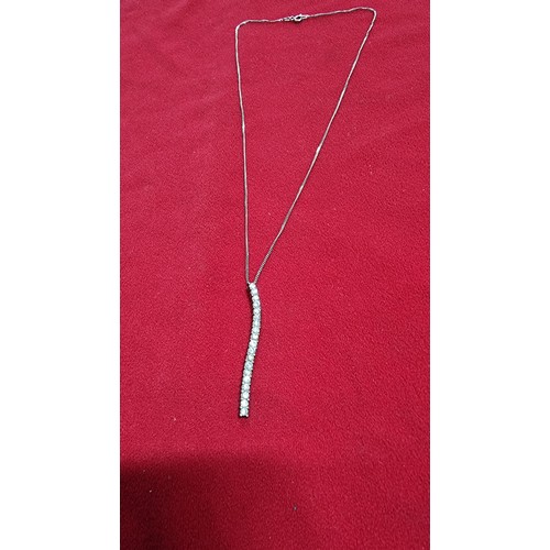 147 - 925 silver drop pendant, pave set with a quantity of CZ stones on a 18 inch 925 silver chain