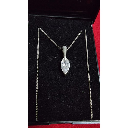 164 - 925 silver pendant inset with a large CZ stone on a 16 inch 925 silver chain