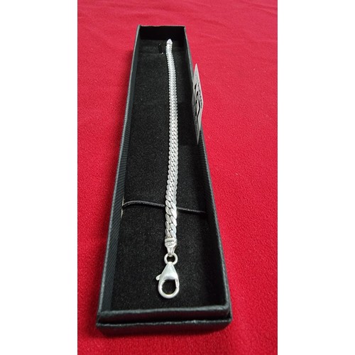 167 - 925 silver curved link bracelet, total length of the bracelet is 7.5 inches x width 4mm.