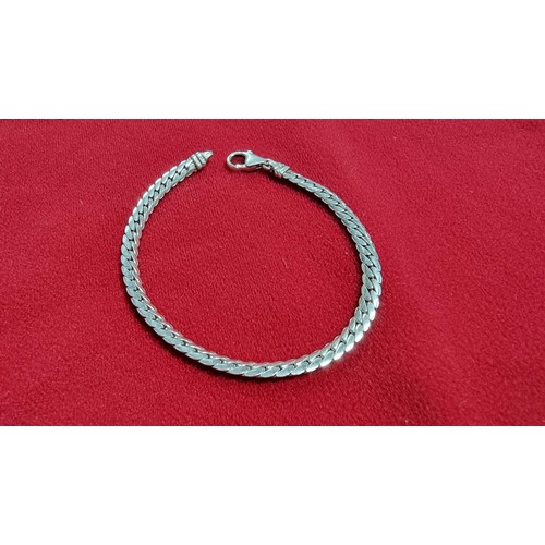 167 - 925 silver curved link bracelet, total length of the bracelet is 7.5 inches x width 4mm.