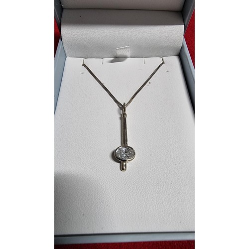 172 - 925 silver pendant with a large CZ stone set on a 18 inch 925 silver chain in its original box by DE... 