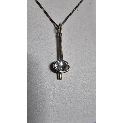 172 - 925 silver pendant with a large CZ stone set on a 18 inch 925 silver chain in its original box by DE... 