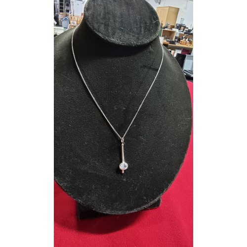 172 - 925 silver pendant with a large CZ stone set on a 18 inch 925 silver chain in its original box by DE... 