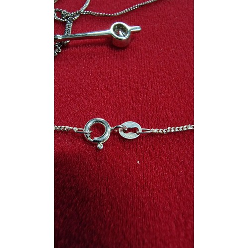 172 - 925 silver pendant with a large CZ stone set on a 18 inch 925 silver chain in its original box by DE... 