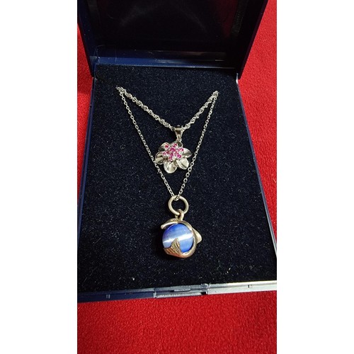 173 - Bundle of 2x 925 silver pendants both on a 18 inch 925 silver chains