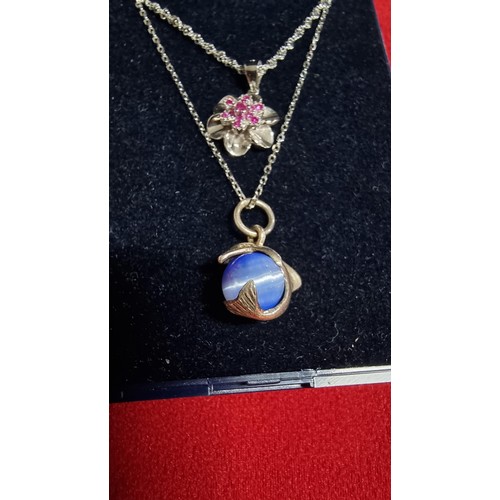 173 - Bundle of 2x 925 silver pendants both on a 18 inch 925 silver chains