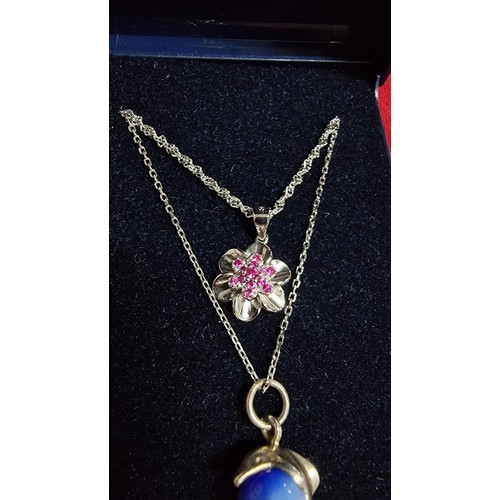 173 - Bundle of 2x 925 silver pendants both on a 18 inch 925 silver chains