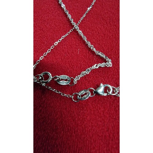 173 - Bundle of 2x 925 silver pendants both on a 18 inch 925 silver chains
