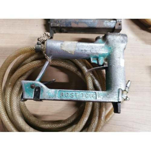 15 - Quantity of vintage pneumatic staple guns inc 2x Bostitch along with 3x Pneumatic sets of tubes