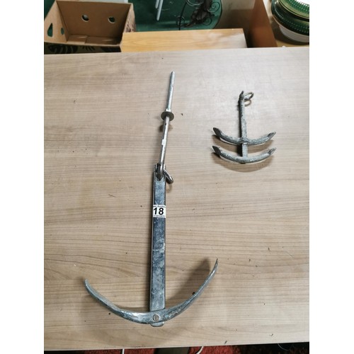 18 - 2x boating anchors, one is a dingy anchor with a adjustable double anchor mechanism.