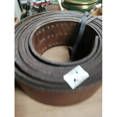 21 - 2x rolls of over 1 meter in length of thick leather strapping measuring 6mm thick, 1 roll is 10cm wi... 