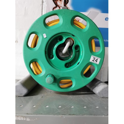 24 - Wall mounted hozelock hose reel