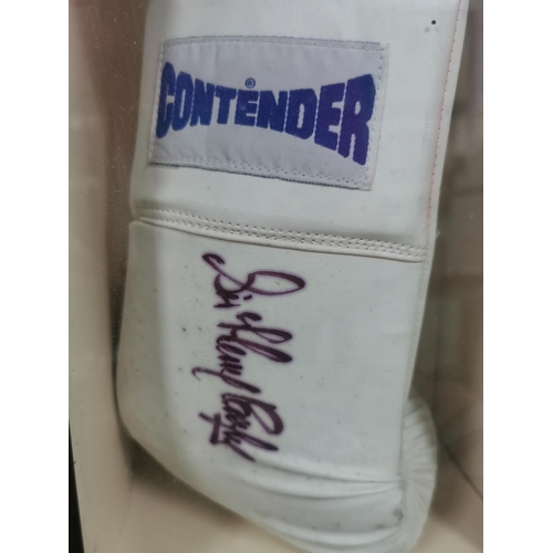 175 - Framed and glazed  case containing a hand signed Contender Boxing glove signed by The Legendary Sir ... 