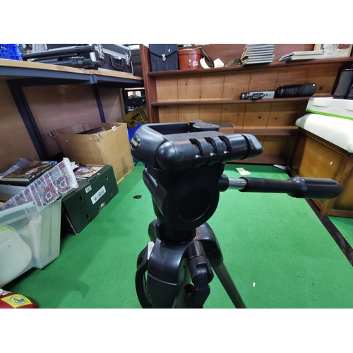 203 - Hama carbon coated star 61 camera tripod with multiple adjustments and spirit levels fitted.