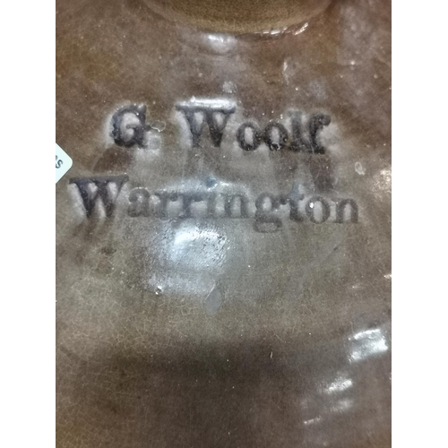 210 - Very large stoneware flagon marked G Woolf Warrington along with a stoneware pot. 58cm high with a b... 