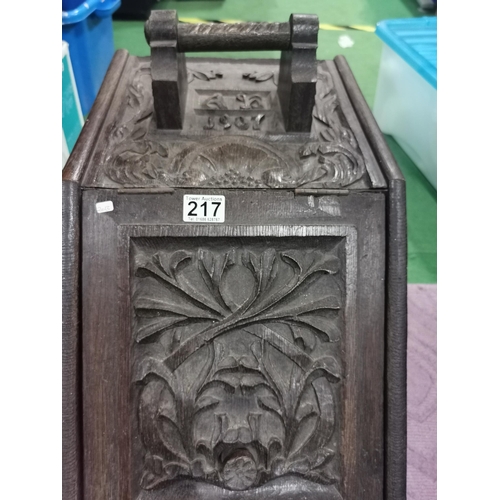 217 - Very  heavy highly decorative hand carved wooden coal skuttle dated 1907 contains its metal liner. H... 