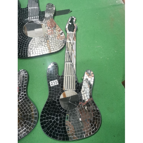 235 - 3 guitar shaped mirror's with a mosiac design. Tallest guitar measures 103cm.