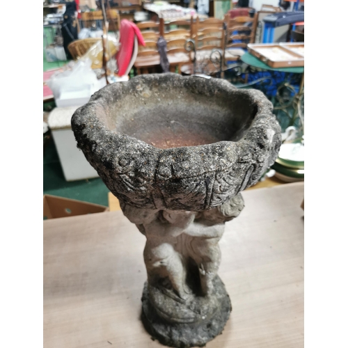 54 - 3 Cherub formed concrete bird bath with good patina. Height of 56cm x 32cm diameter