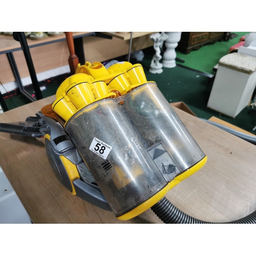 58 - Yellow Dyson Twin cylinder vacuum cleaner with telescopic arm in good working order