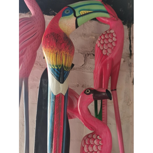 69 - Quantity of wooden items inc flamingos and toucans etc. Tallest piece measures 98cm