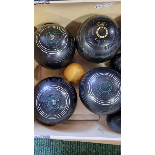 80 - large qty of lawn bowls along with a cased set of Crown Green bowls by PK, also includes a carpet bo... 