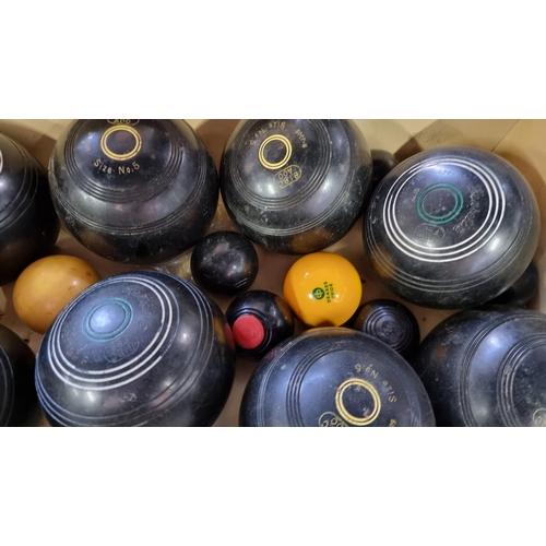 80 - large qty of lawn bowls along with a cased set of Crown Green bowls by PK, also includes a carpet bo... 