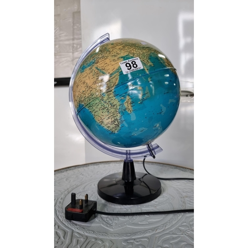 98 - Illuminated globe, measures 40cm height, 24cm diameter.